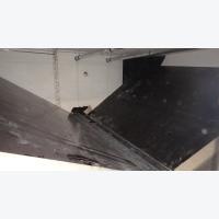 Herrichtung des Pellet-Lagers durch Installation einer Schrägbodenkonstruktion